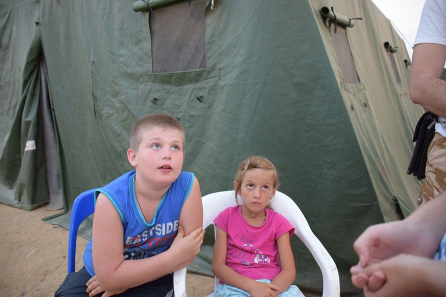 Vitalij, 10, berättar om hur människor i hans bostadsområde dödats av artilleri.