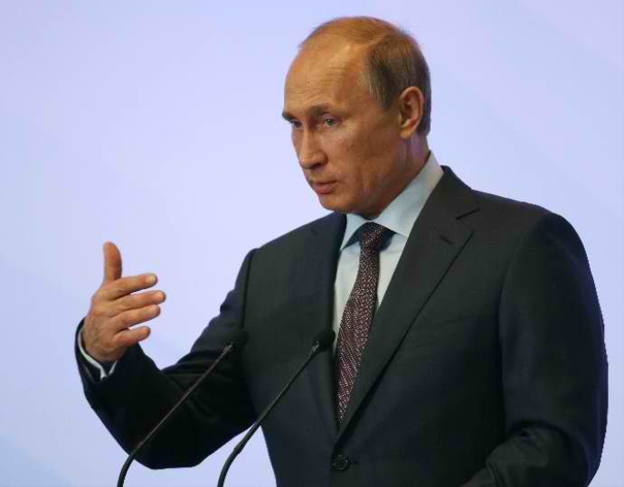 Rysslands president Vladimir Putin presenterar en plan för ett eldupphör i i sydöstra Ukraina.
